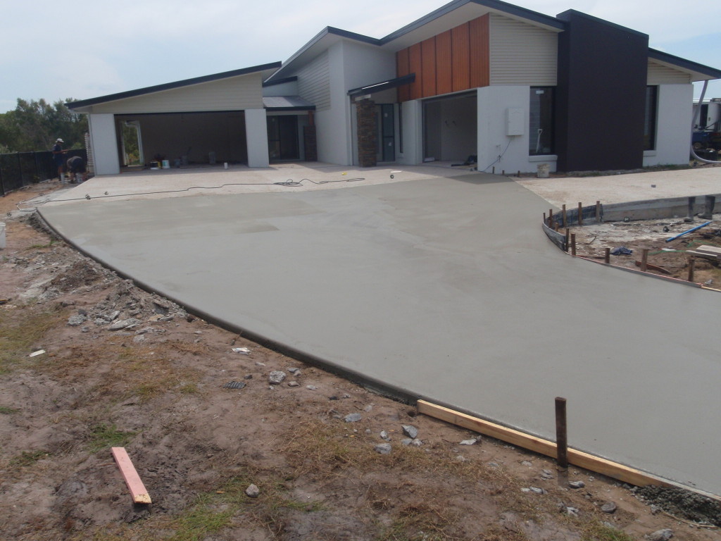 concrete driveway just poured Brisbane Concrete, Landscaping